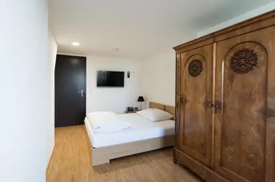 Ein Bett oder Betten in einem Zimmer der Unterkunft Seminar- und Businesshotel Schloss Hofen