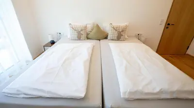 Ein Bett oder Betten in einem Zimmer der Unterkunft Ferienwohnung EMI