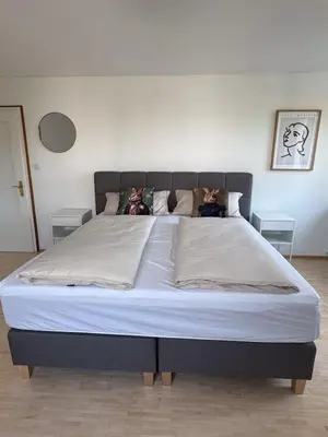 Ein Bett oder Betten in einem Zimmer der Unterkunft Bergblick & Dorfgefühl in Hörbranz