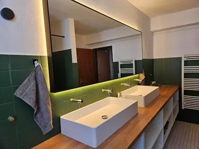 Ein Badezimmer in der Unterkunft Der Alpenfrieden
