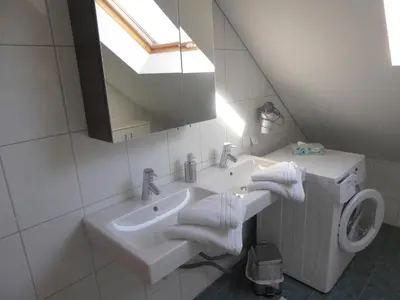 Ein Badezimmer in der Unterkunft Schottar FeWo ST 09