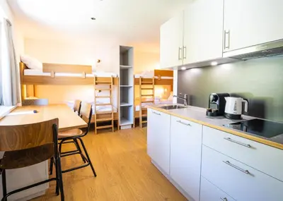 Küche/Küchenzeile in der Unterkunft Appartements Basecamp Warth