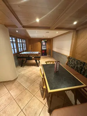 Eine Spielezimmer in der Unterkunft FeWo 236 Aparthotel Mittelberg