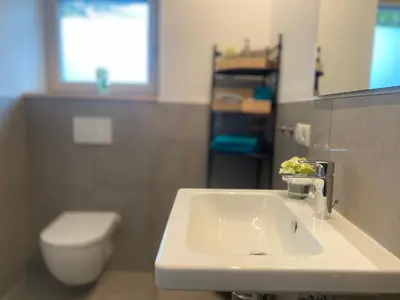 Ein Badezimmer in der Unterkunft Neueröffnung! Gästezimmer im Herzen von Lauterach