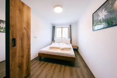 Ein Bett oder Betten in einem Zimmer der Unterkunft Ferienwohnung Wallis