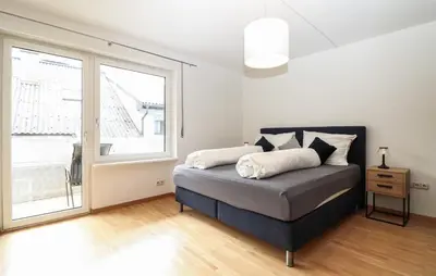 Ein Bett oder Betten in einem Zimmer der Unterkunft Ferienwohnung In Bludenz