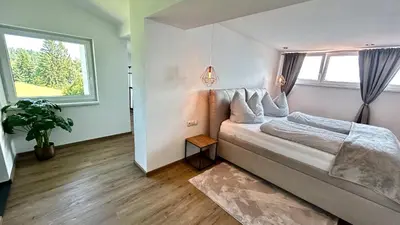 Ein Bett oder Betten in einem Zimmer der Unterkunft Haus Susanne