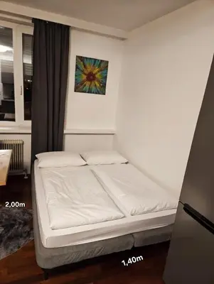 Ein Bett oder Betten in einem Zimmer der Unterkunft Loki's Apartment