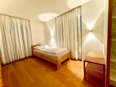 Ein Bett oder Betten in einem Zimmer der Unterkunft MySuite