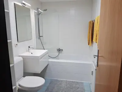 Ein Badezimmer in der Unterkunft Top Glück Apartmenthaus Sonnenschein