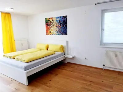 Ein Bett oder Betten in einem Zimmer der Unterkunft Top Glück Apartmenthaus Sonnenschein