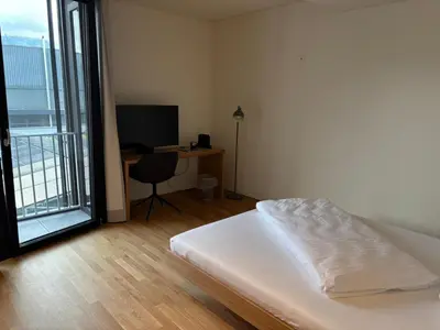 Ein Bett oder Betten in einem Zimmer der Unterkunft Herburger Living