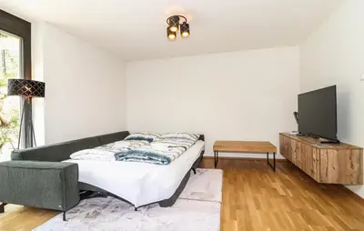 Ein Bett oder Betten in einem Zimmer der Unterkunft Ferienwohnung Mit Terrasse