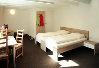 Ein Bett oder Betten in einem Zimmer der Unterkunft Haus Gaues