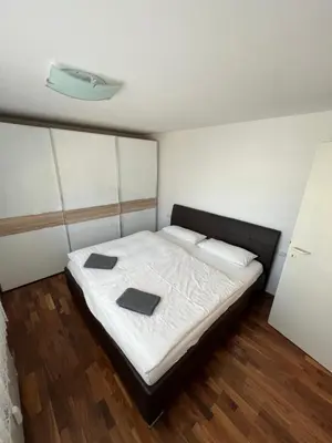 Ein Bett oder Betten in einem Zimmer der Unterkunft Modern apartment in a top location and free Parking