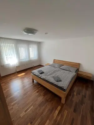 Ein Bett oder Betten in einem Zimmer der Unterkunft Modern apartment in a top location and free Parking