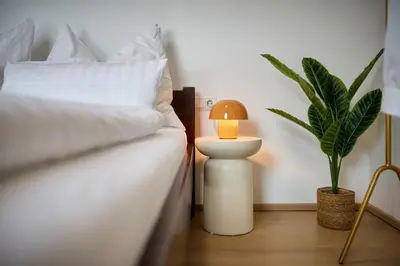 Ein Bett oder Betten in einem Zimmer der Unterkunft VORALIVING - Modernes Neubau Apartment Toplage - Parkplatz - WLAN, 24 7 Check-in