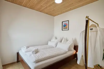 Ein Bett oder Betten in einem Zimmer der Unterkunft VORALIVING - Modernes Neubau Apartment Toplage - Parkplatz - WLAN, 24 7 Check-in