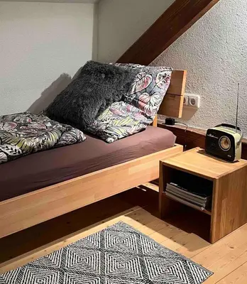 Ein Bett oder Betten in einem Zimmer der Unterkunft Kraftquelle Widum Sulzberg