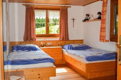 Ein Bett oder Betten in einem Zimmer der Unterkunft Villa Mondschein