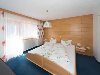 Ein Bett oder Betten in einem Zimmer der Unterkunft Haus Margrith Alpenblick Appartements