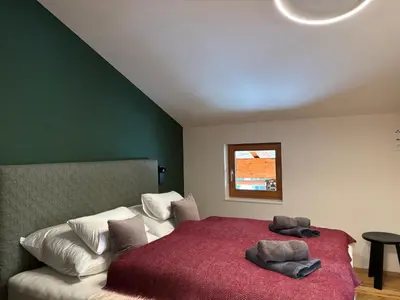 Ein Bett oder Betten in einem Zimmer der Unterkunft Zug503 Apartments - Lech am Arlberg