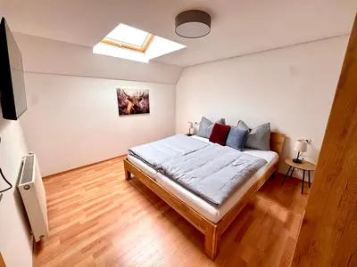 Ein Bett oder Betten in einem Zimmer der Unterkunft Loft 73
