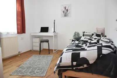 Ein Bett oder Betten in einem Zimmer der Unterkunft ARI's Domizil nähe Bodensee & Bregenz-City