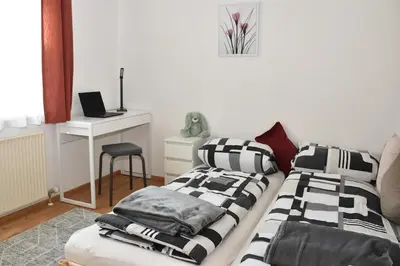 Ein Bett oder Betten in einem Zimmer der Unterkunft ARI's Domizil nähe Bodensee & Bregenz-City