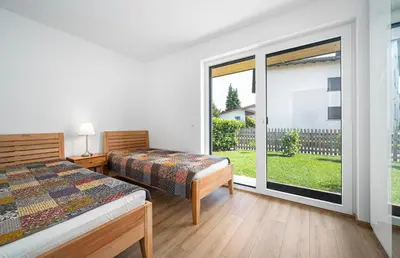 Ein Bett oder Betten in einem Zimmer der Unterkunft Moderner Bungalow in Seenähe