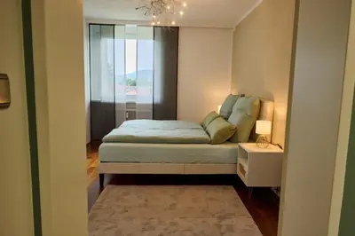 Ein Bett oder Betten in einem Zimmer der Unterkunft Ferienwohnung in Dornbirn