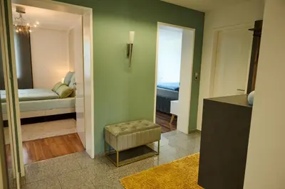 Ein Bett oder Betten in einem Zimmer der Unterkunft Ferienwohnung in Dornbirn