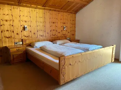 Ein Bett oder Betten in einem Zimmer der Unterkunft Haus Kanisfluh
