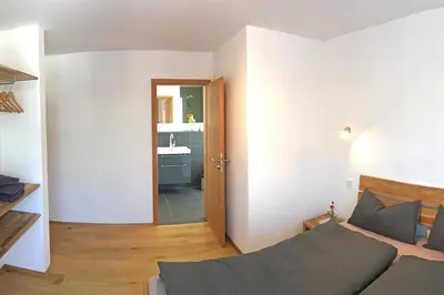 Ein Bett oder Betten in einem Zimmer der Unterkunft Walser Berghaus