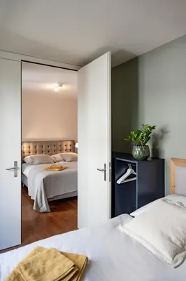 Ein Bett oder Betten in einem Zimmer der Unterkunft Loft am See im Herzen von Bregenz