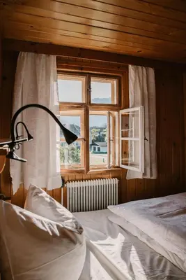 Ein Bett oder Betten in einem Zimmer der Unterkunft Hus Sigritta