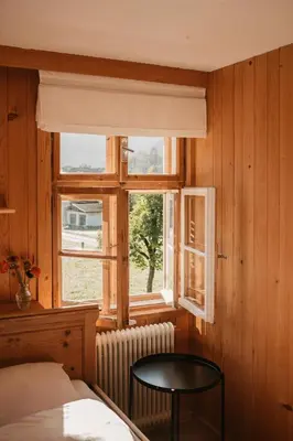 Ein Bett oder Betten in einem Zimmer der Unterkunft Hus Sigritta