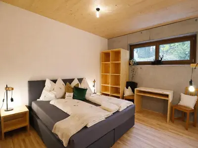Ein Bett oder Betten in einem Zimmer der Unterkunft Dog-friendly holiday apartment in Bregenzerwald