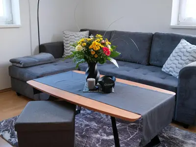 Ein Sitzbereich in der Unterkunft Haus Gallys