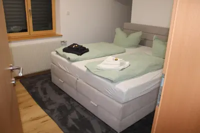 Ein Bett oder Betten in einem Zimmer der Unterkunft Ferienwohnung Vögel