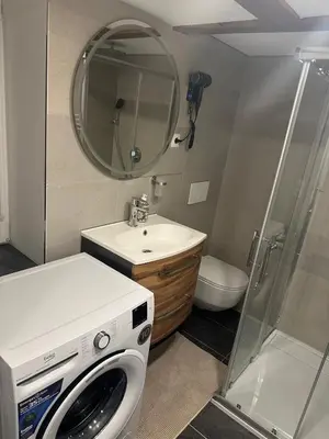 Ein Badezimmer in der Unterkunft Alpina Apartment Premium