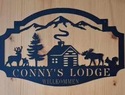 Ein Zertifikat, Auszeichnung, Logo oder anderes Dokument, das in der Unterkunft Conny's Lodge ausgestellt ist