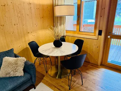 Ein Sitzbereich in der Unterkunft Mellau Apartments