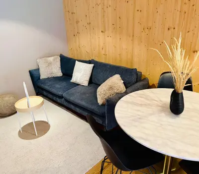 Ein Sitzbereich in der Unterkunft Mellau Apartments