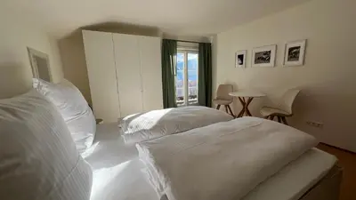 Ein Bett oder Betten in einem Zimmer der Unterkunft Die Talstation