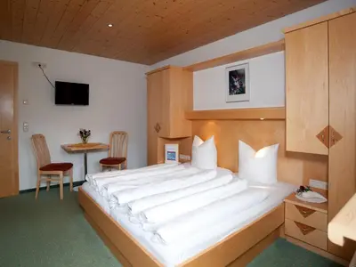 Ein Bett oder Betten in einem Zimmer der Unterkunft Apartment in Damüls near Hiking Trails