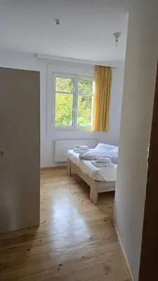 Ein Bett oder Betten in einem Zimmer der Unterkunft Sunset View Apartment Bregenz Bodensee