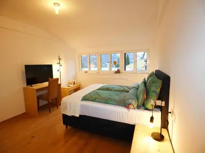 Ein Bett oder Betten in einem Zimmer der Unterkunft Holiday apartment in Bregenzerwald
