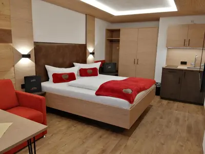 Ein Bett oder Betten in einem Zimmer der Unterkunft Hotel Kasimir