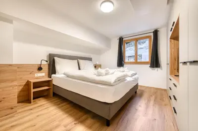 Ein Bett oder Betten in einem Zimmer der Unterkunft Ferienwohnung Gipfelstube
